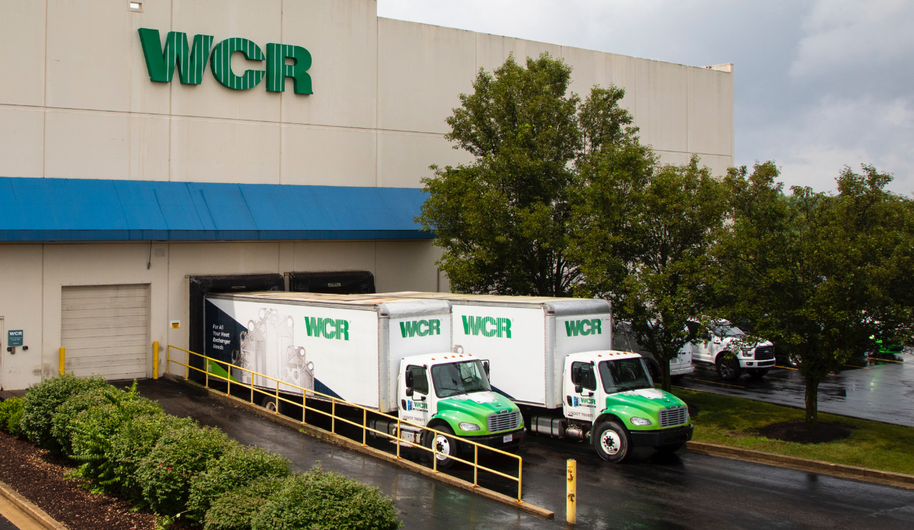 Service trucks in WCR warehouse bay